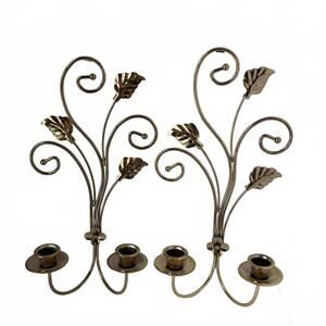 Vintage pair of gold-toned metal wall sconces with leaf and vine motifs